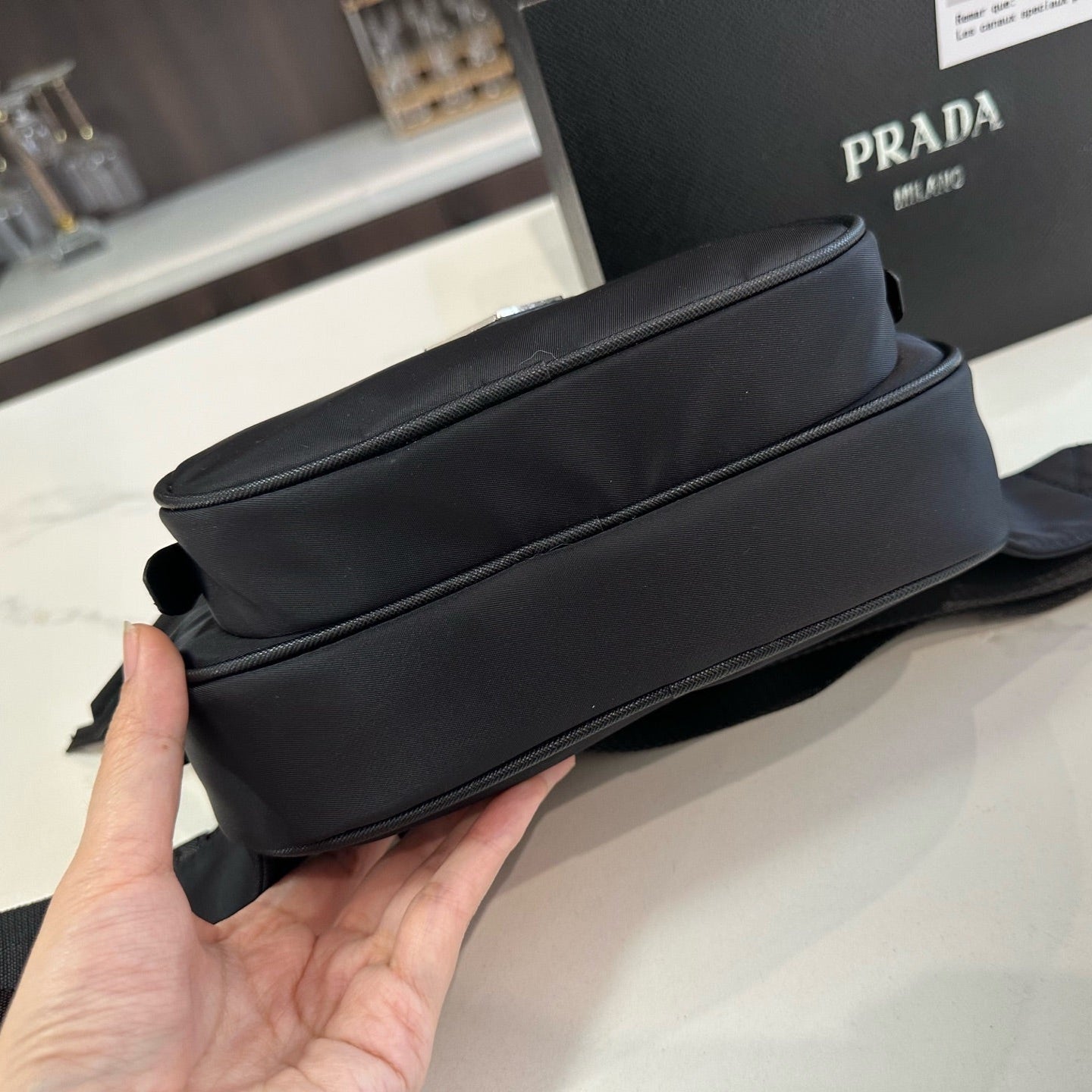 FRONT ZIP POCKET CROSSBODY BAG 24 IN BLACK RE-NYLON