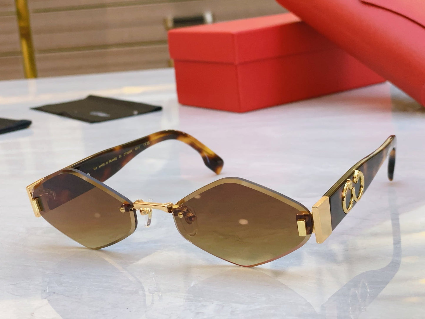 PANTHÈRE RHOMBUS FRAME SUNGLASSES CT00638S IN METAL AND ACETATE