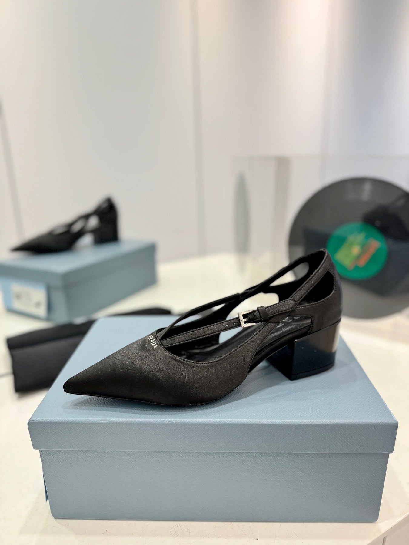 PRA STRAP CUT-OUT PUMPS BLACK SATIN
