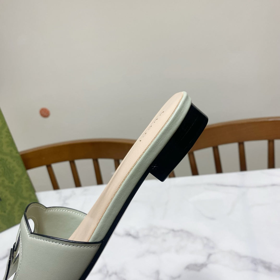 INTERLOCKING G SLIDE SANDAL IN PASTEL GREEN AND BEIGE CALFSKIN