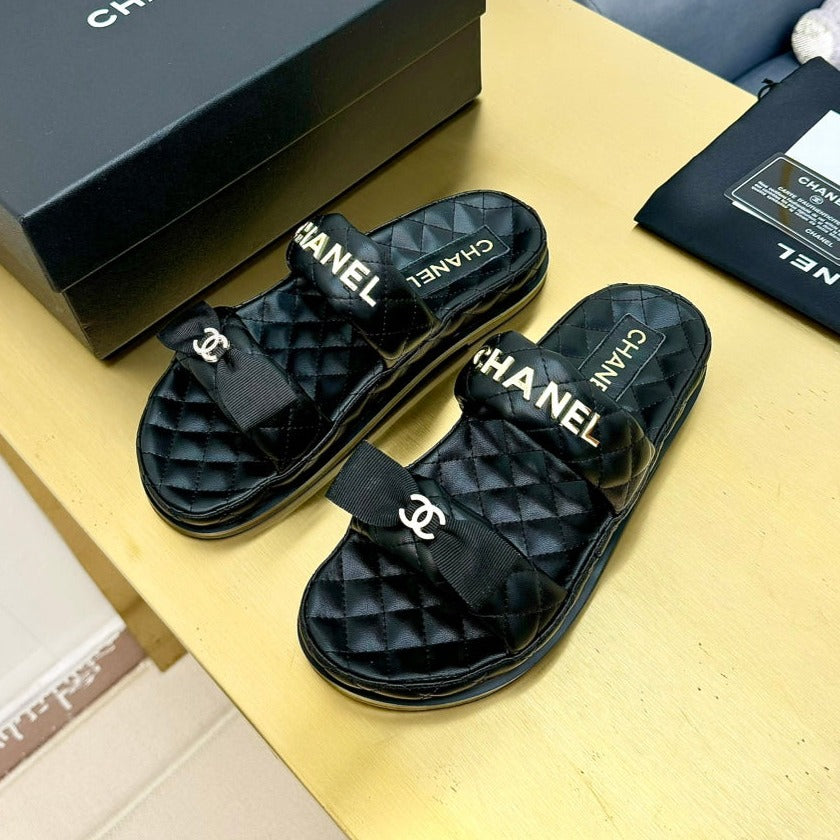 DAD SANDALS WITH BOW IN BLACK LAMBSKIN MULE