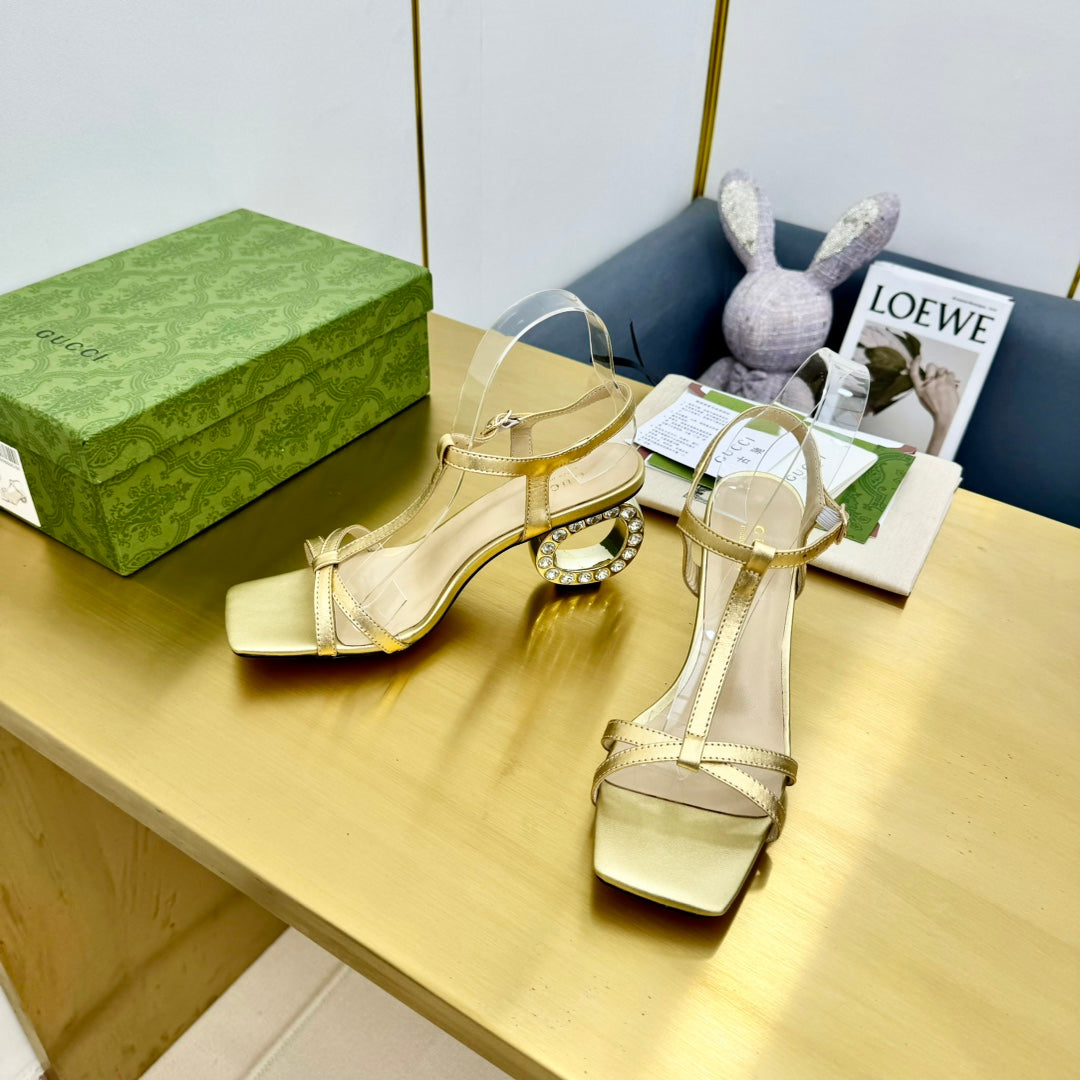 MEDIUM-HEEL SANDAL IN GOLD CALFSKIN GOLD HARDWARE WITH RHINSTONES