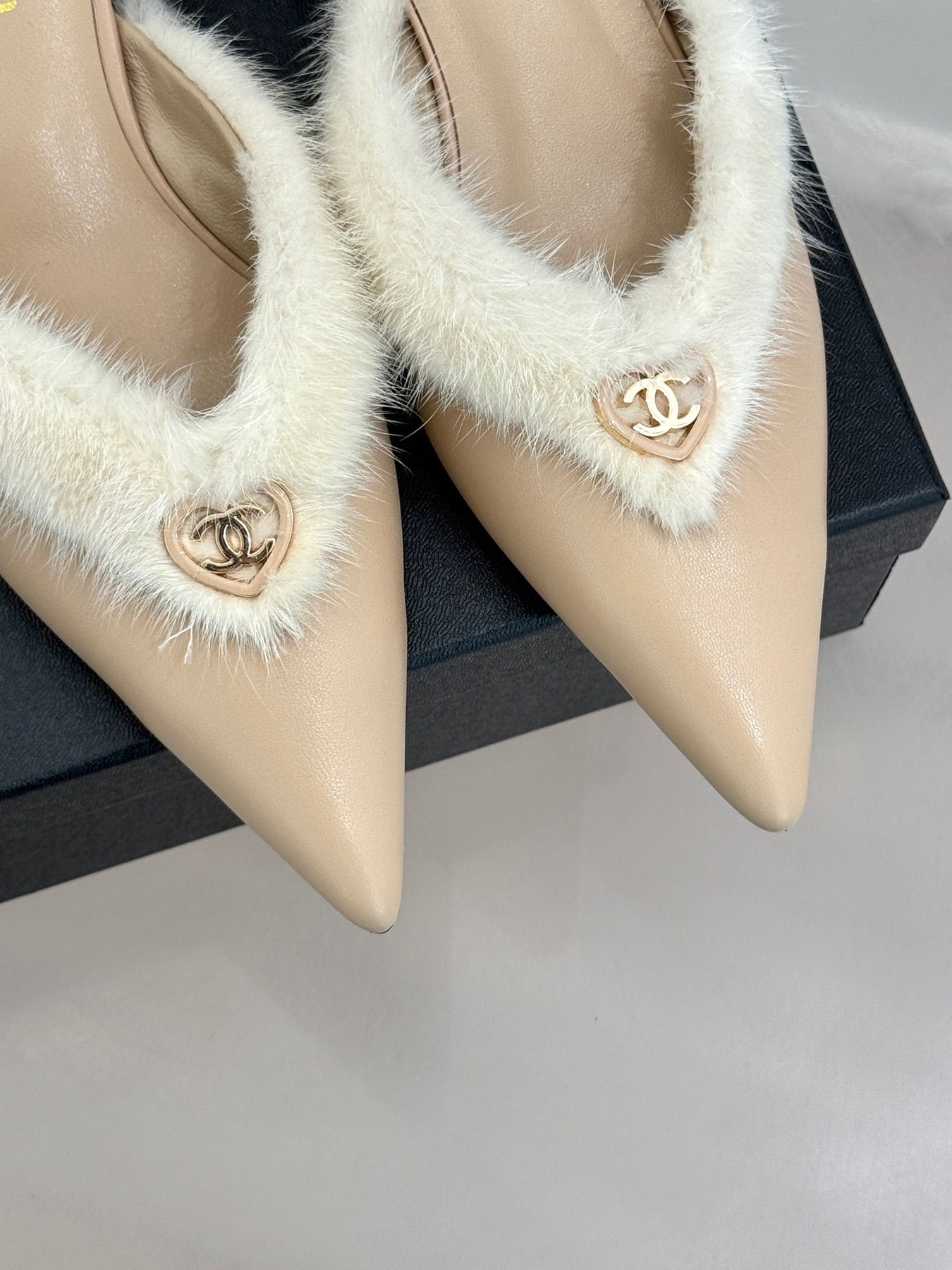 RABBIT FUR POINTED-TOE MULE IN BISQUE BEIGE LAMBSKIN