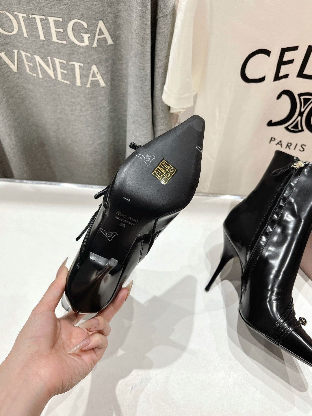 HIGH HEEL POINTED-TOE BOOTS IN BLACK SHINY LAMBSKIN