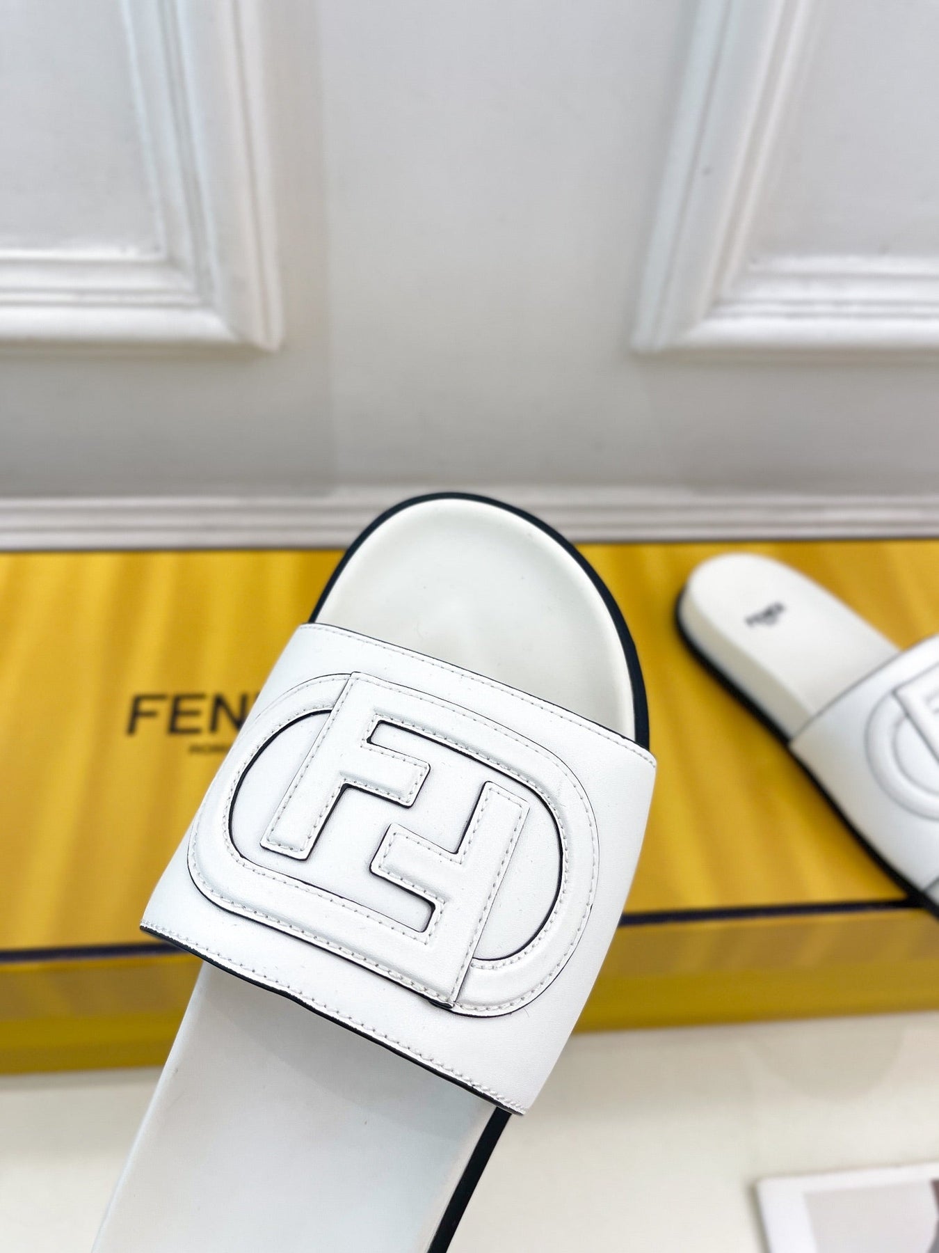 FENDI LOGO SLIDES IN WHITE CALFSKIN