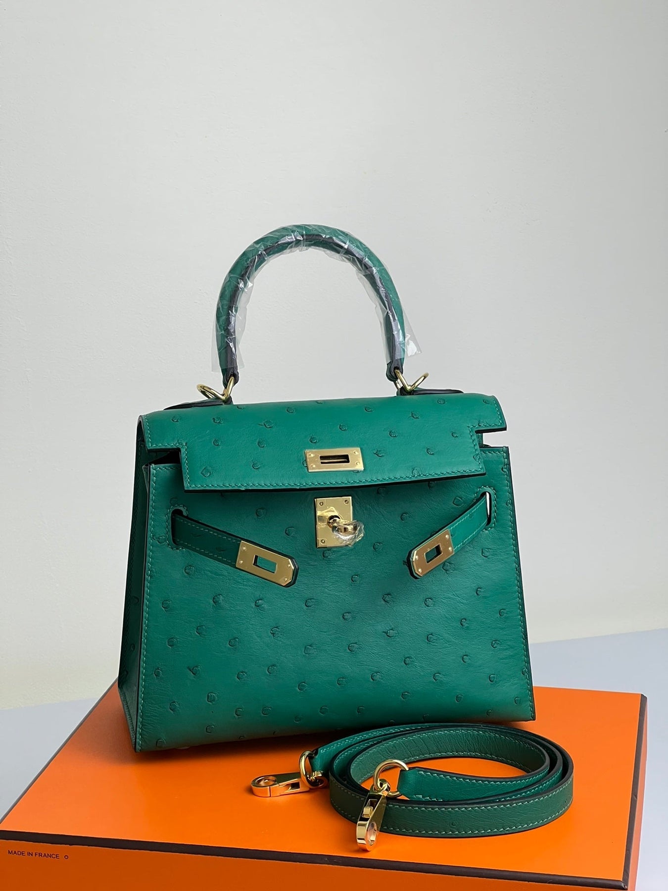 KELLY BAG 20 IN TEAL GREEN OSTRICH LEATHER WITH GOLD HARDWARE