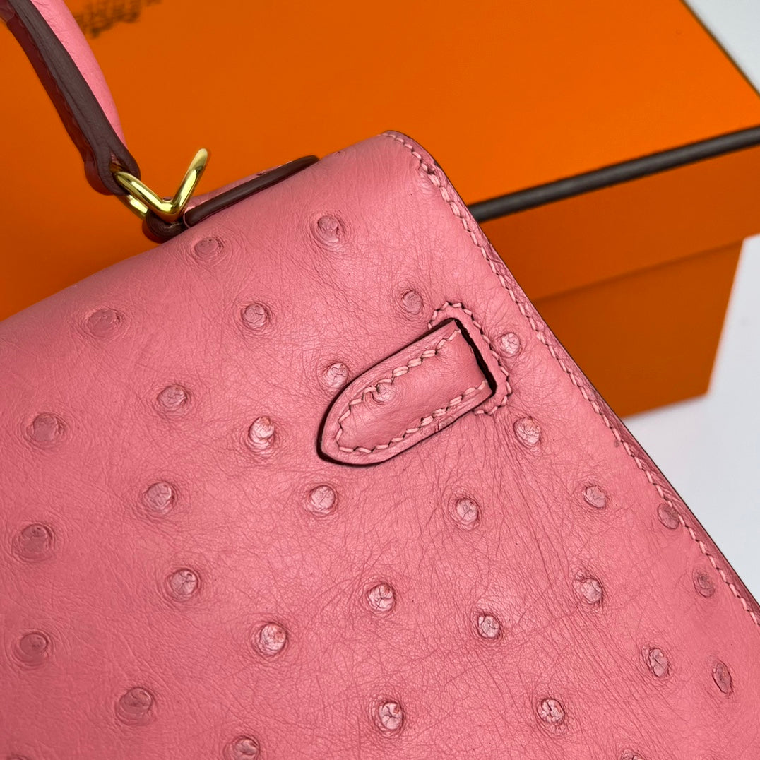 KELLY BAG 20 IN ROUGE PINK OSTRICH LEATHER WITH GOLD HARDWARE