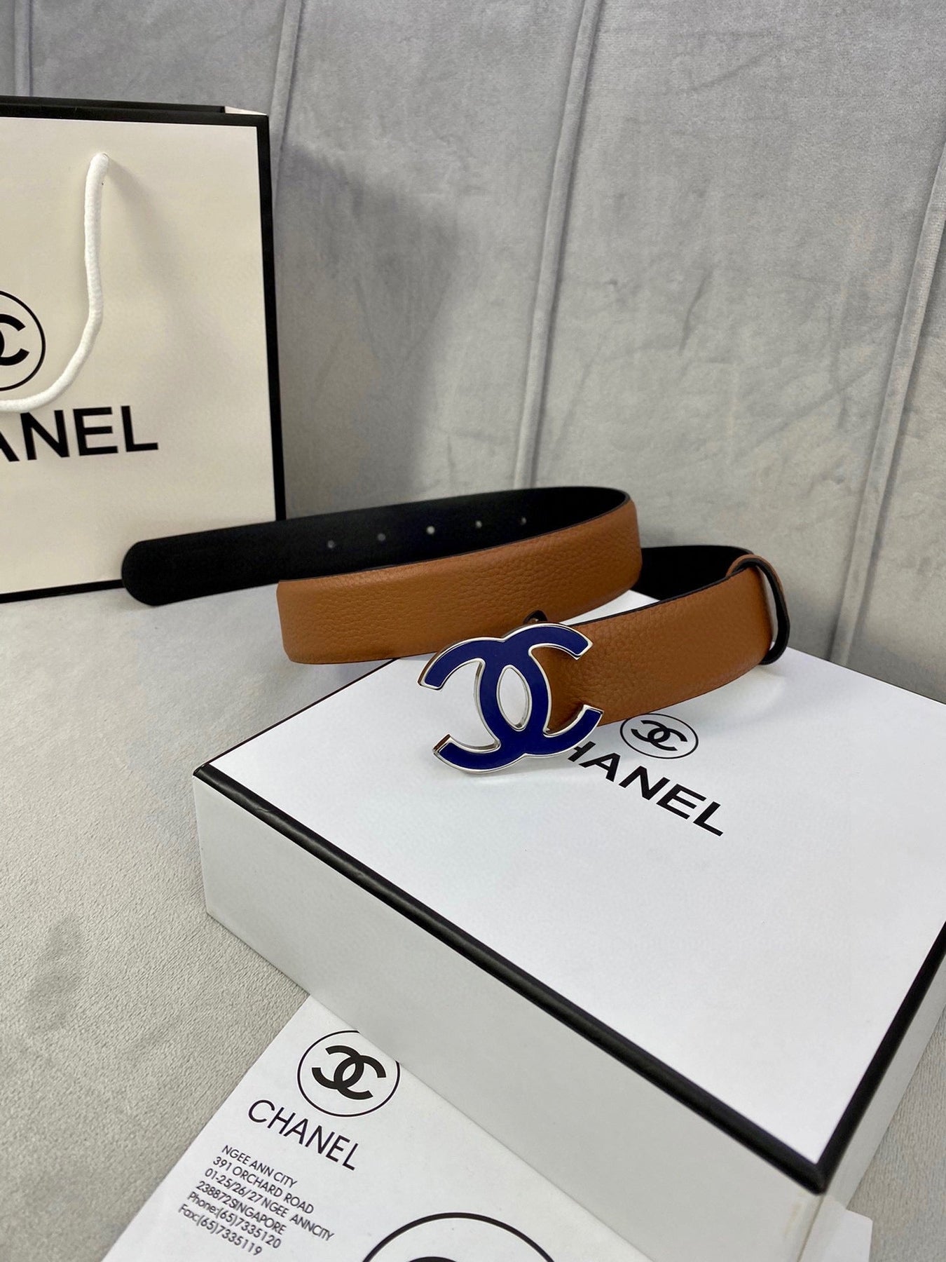 CC 30MM BELT IN BRONZE BROWN GRAINED CALFSKIN WITH NAVY BLUE METAL LOGO
