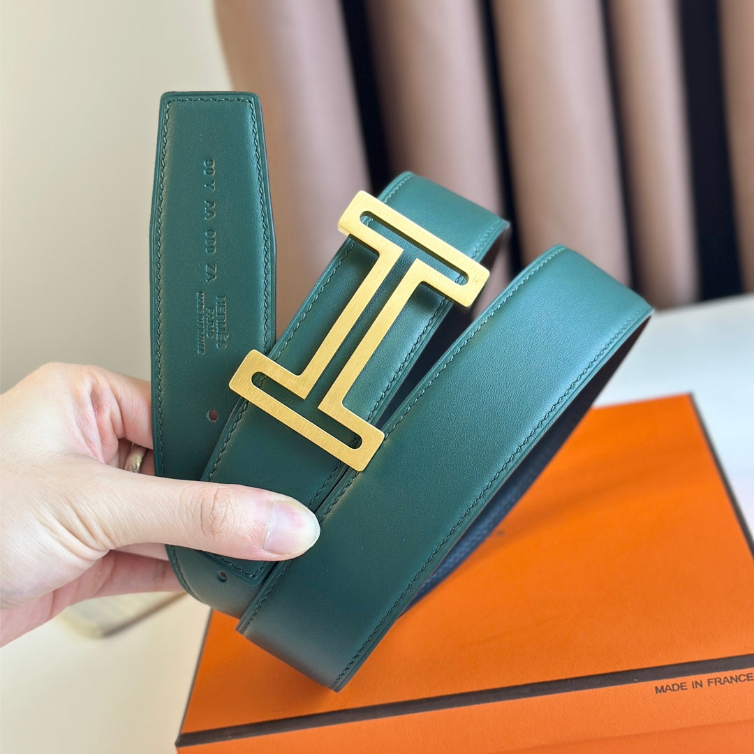 HM  BELT BUCKLE & REVERSIBLE TEAL GREEN AND BLACK LEATHER STRAP 38MM GOLD HARDWARE