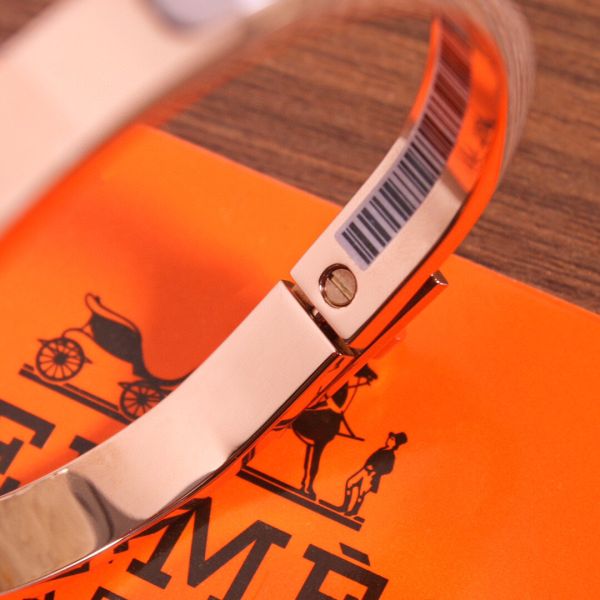 HERM Orange Mini Clic Kelly Bracelet