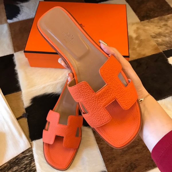 HERM Oran Slide Sandals In Orange Clemence Leather