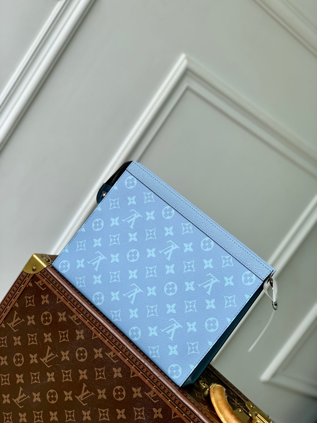 POCHETTE VOYAGE 26 IN LIGHT BLUE MONOGRAM ECLIPSE CALFSKIN