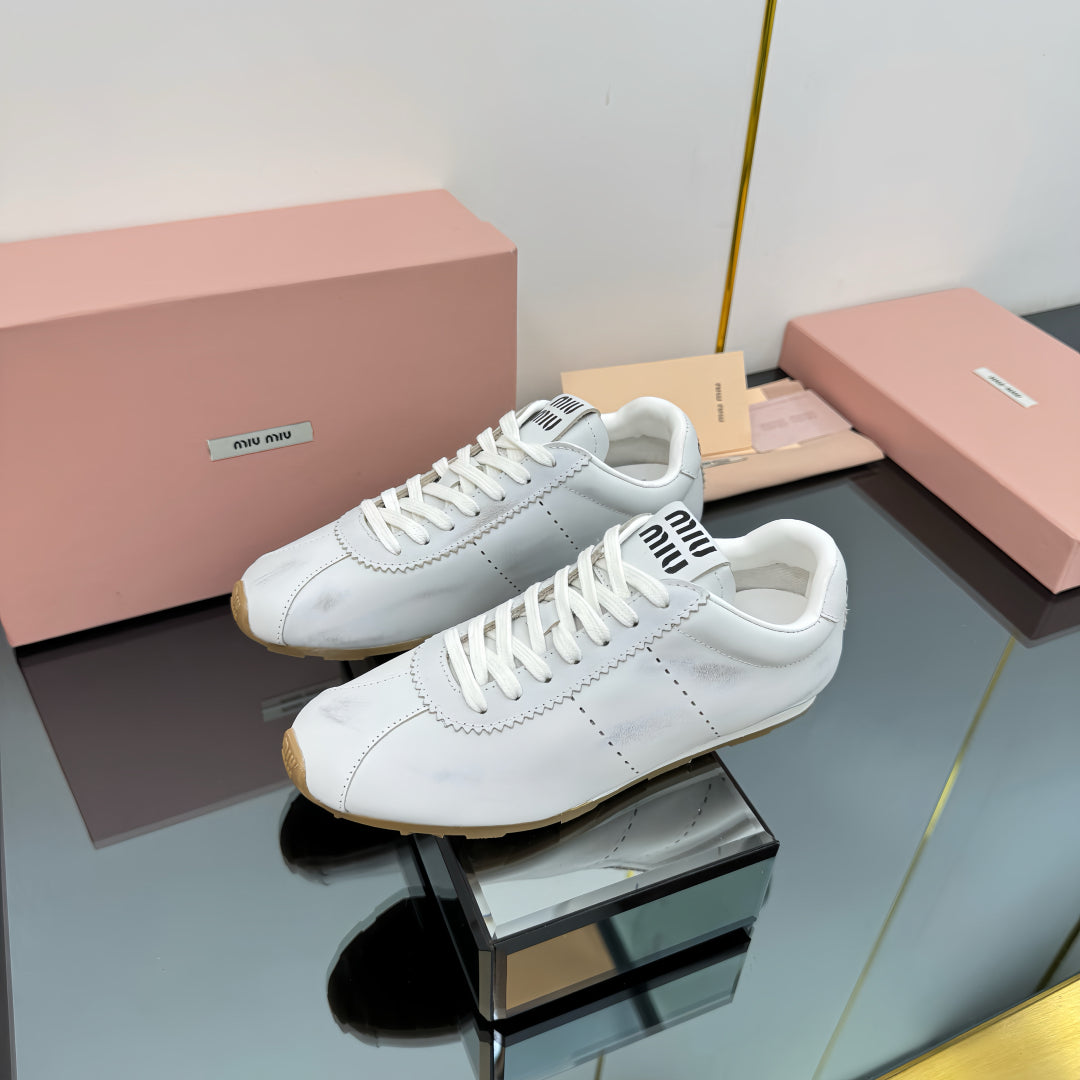 PLUME NAPPA SNEAKERS IN WHITE CALFSKIN