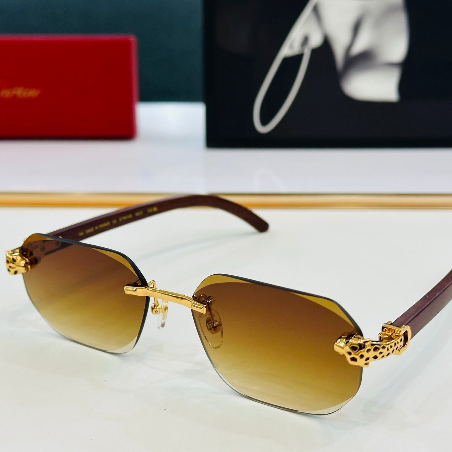 PANTHÈRE RIMLESS OVAL FRAME SUNGLASSES  543637 IN METAL