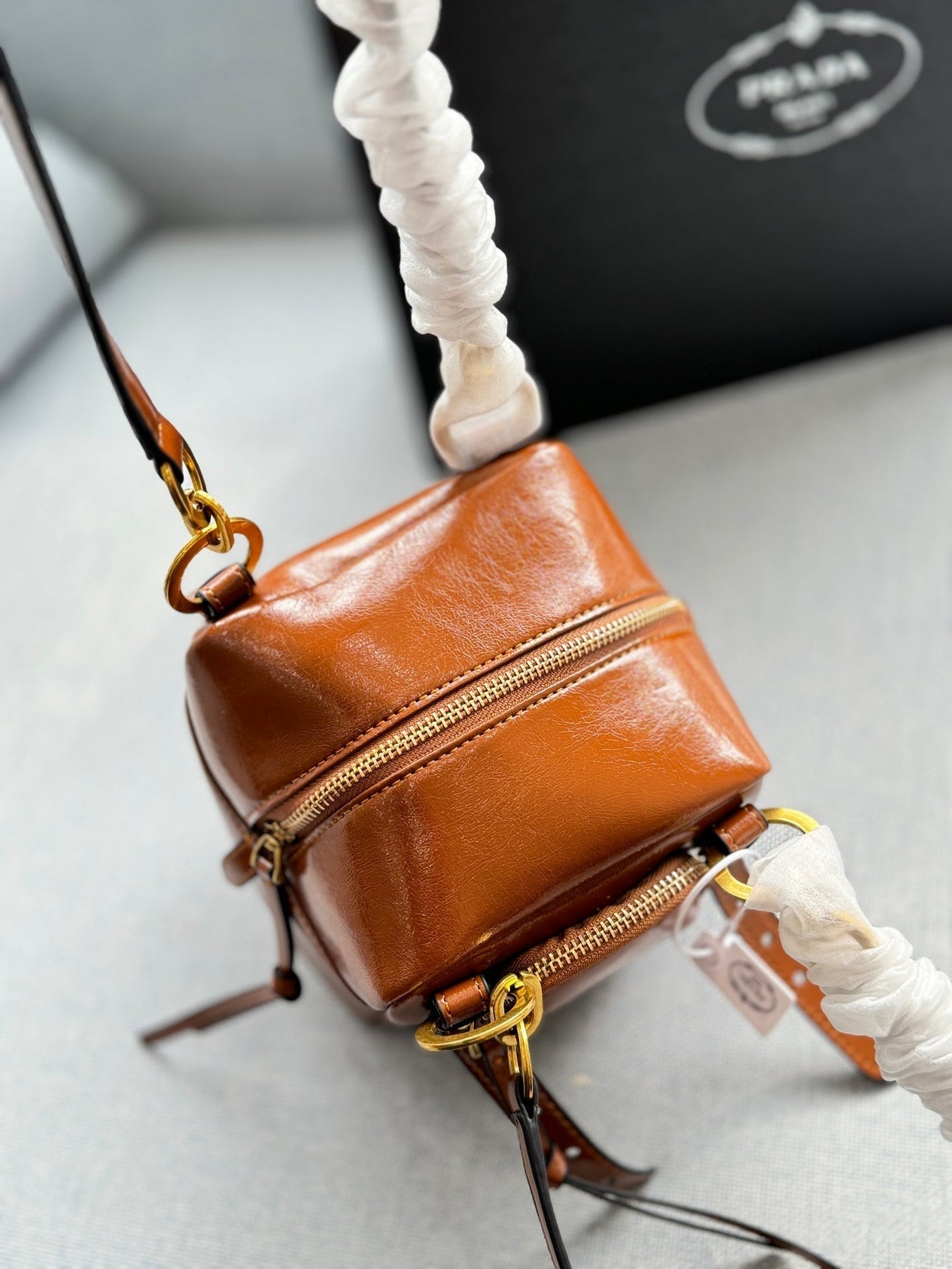 DANGLE TOP HANDLE MINI BAG 15 IN BROWN PATENT CALFSKIN