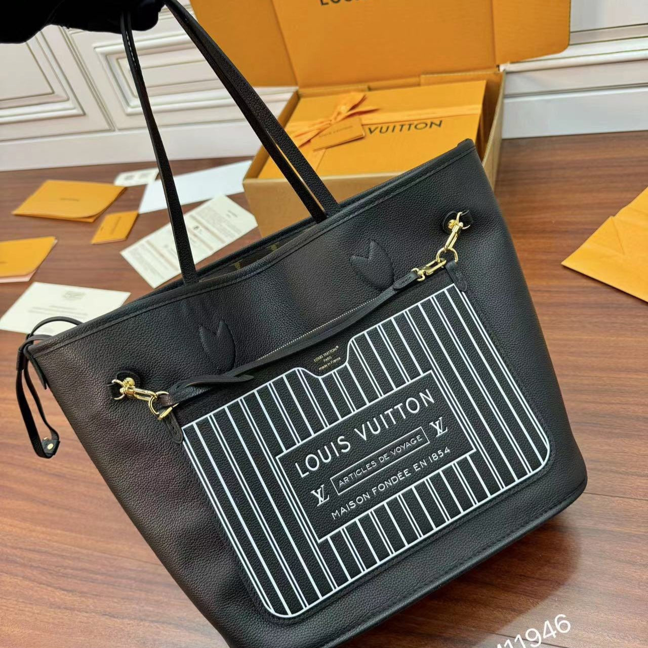 NEVERFULL INSIDE OUT MM BAG 31 IN BROWN MONOGRAM COATED CANVAS AND CALFSKIN