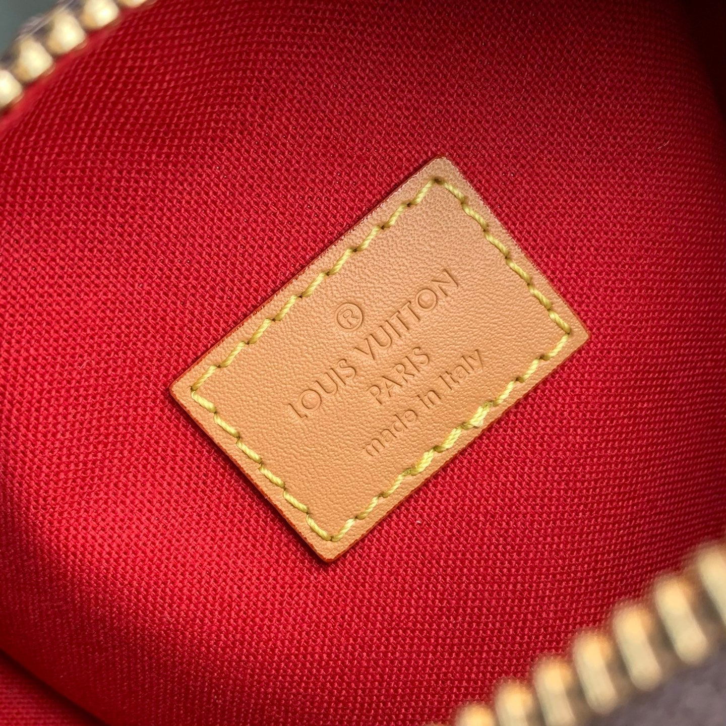 NANO SPEEDY DATING 18 IN BROWN COATED CANVAS GOLD HARDWARE