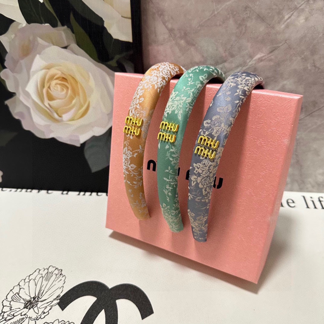 HEADBAND WITH GARNITURE PRINT IN TIGER EYE ORANGE SILK 432822