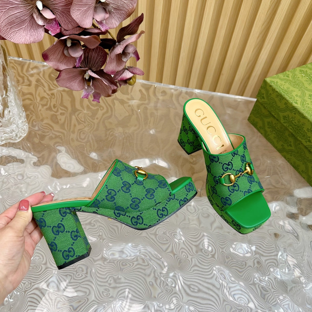 HORSEBIT SLIDE SANDAL IN FOREST GREEN MONOGRAM CANVAS AND SHEEPSKIN LINING