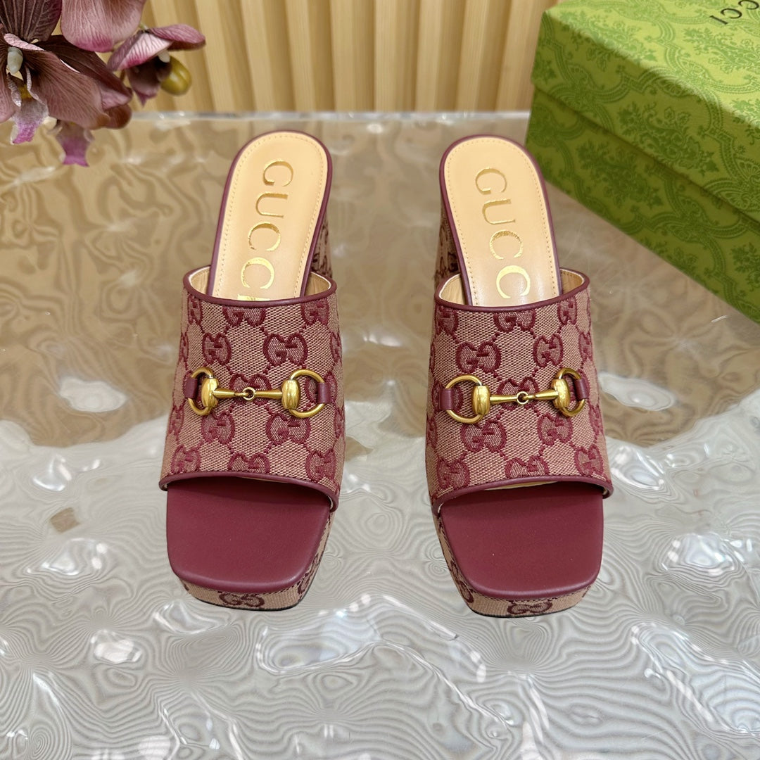 HORSEBIT SLIDE SANDAL IN WINE RED MONOGRAM CANVAS AND SHEEPSKIN LINING