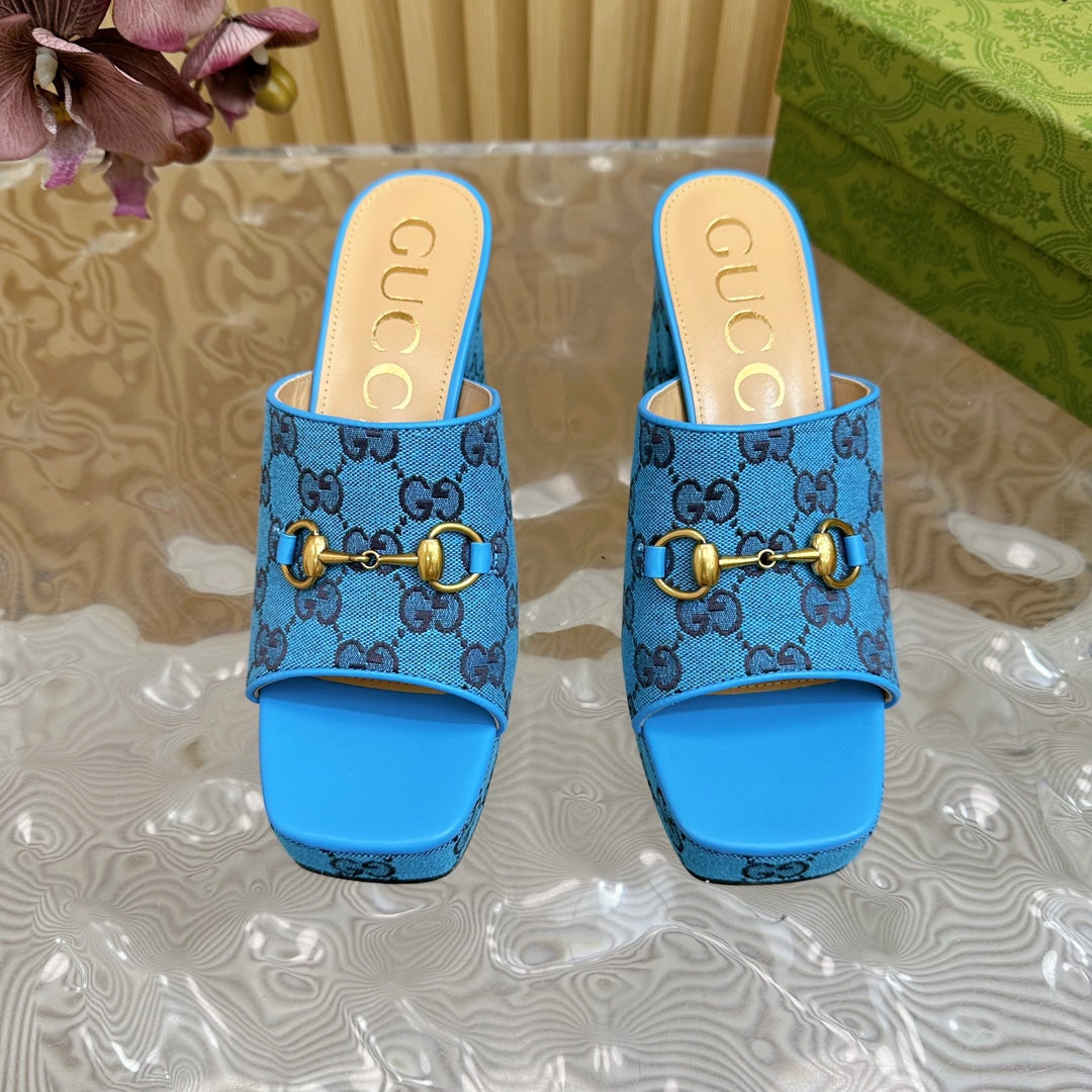 HORSEBIT SLIDE SANDAL IN AZURE BLUE MONOGRAM CANVAS AND SHEEPSKIN LINING