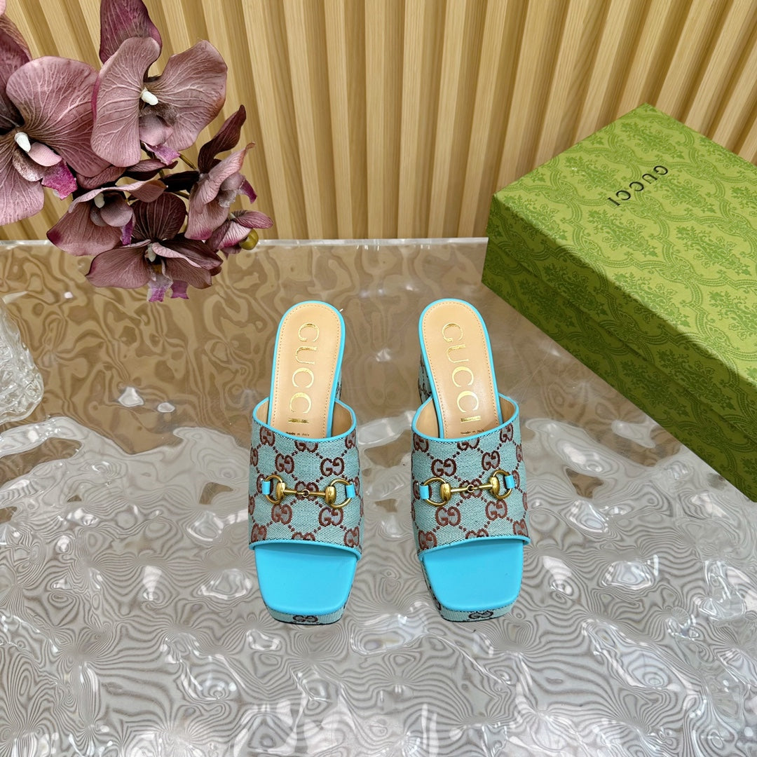 HORSEBIT SLIDE SANDAL IN SKY BLUE MONOGRAM CANVAS AND SHEEPSKIN LINING