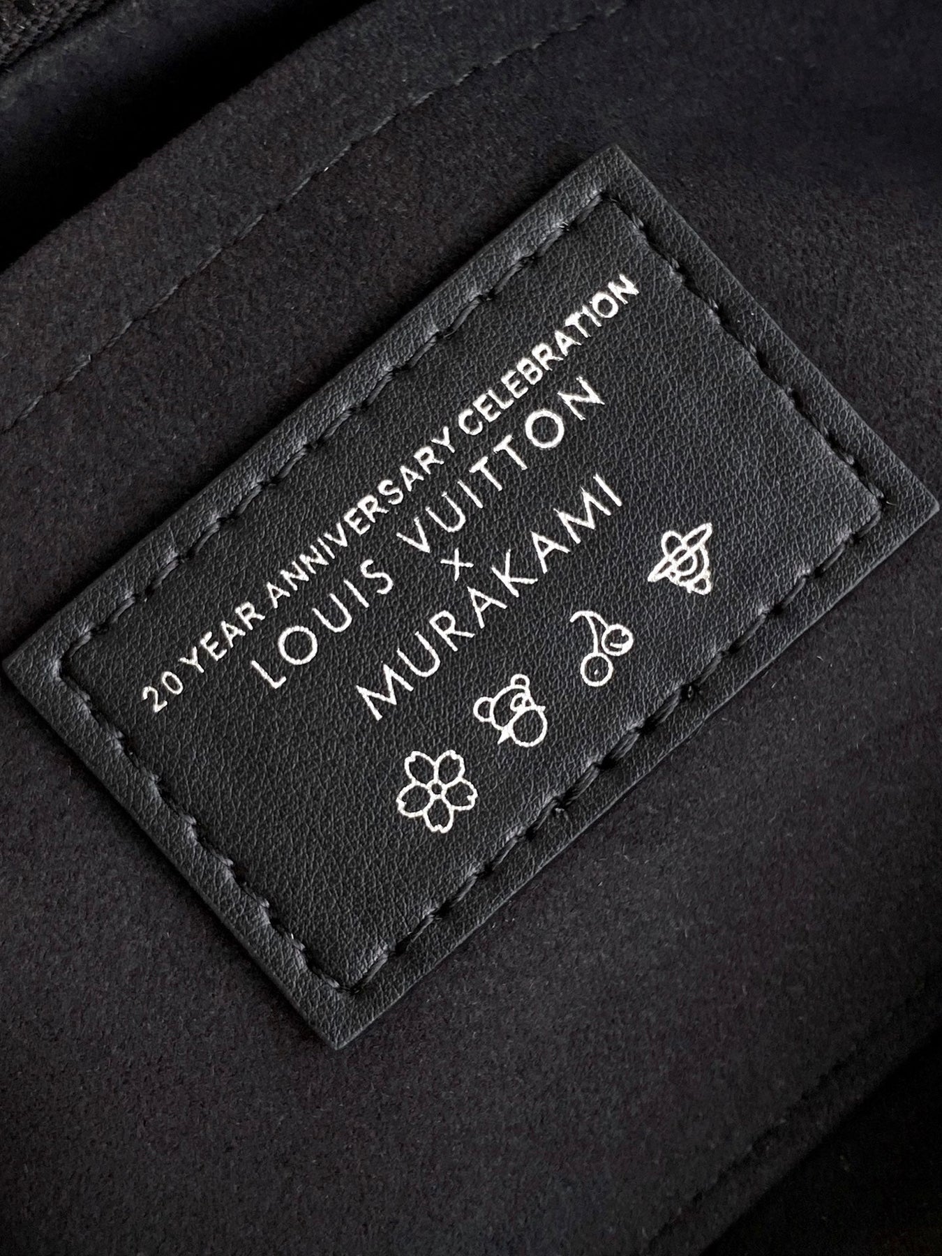 ONTHEGO EAST WEST BAG 25 IN COLORFUL MONOGRAM PATTERN CANVAS