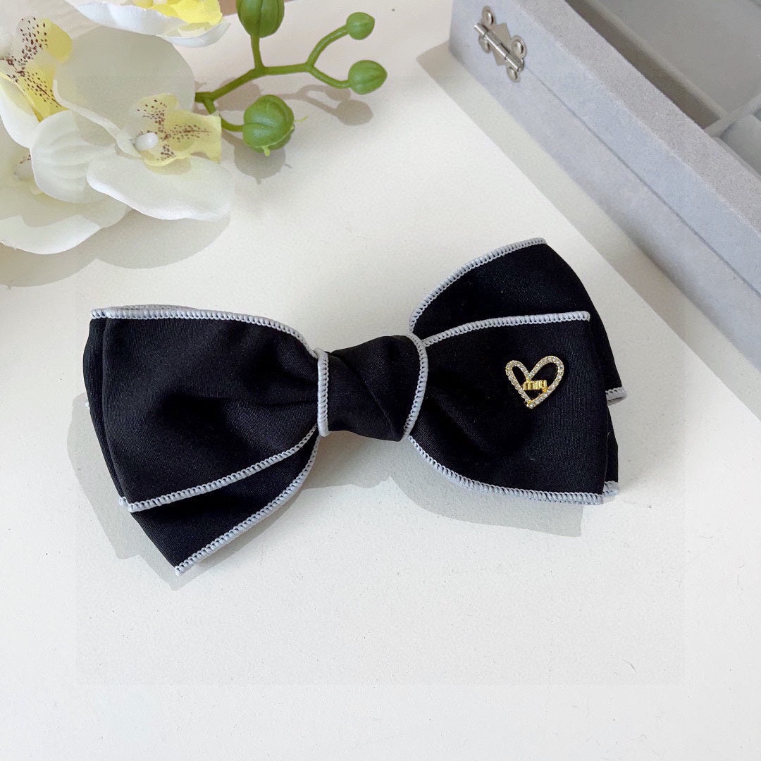 BOW HAIRPIN IN BLACK AND WHITE TRIM COTTON 406022