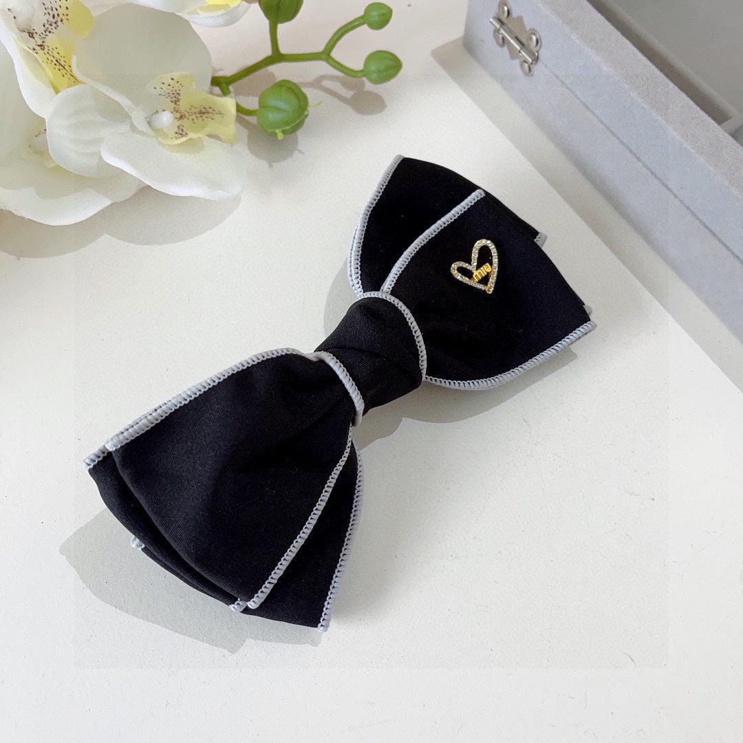 BOW HAIRPIN IN BLACK AND WHITE TRIM COTTON 406022