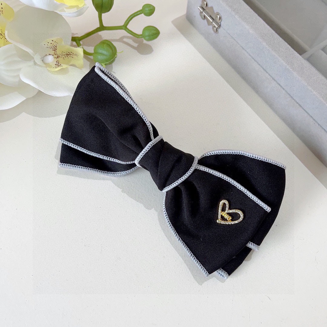 BOW HAIRPIN IN BLACK AND WHITE TRIM COTTON 406022