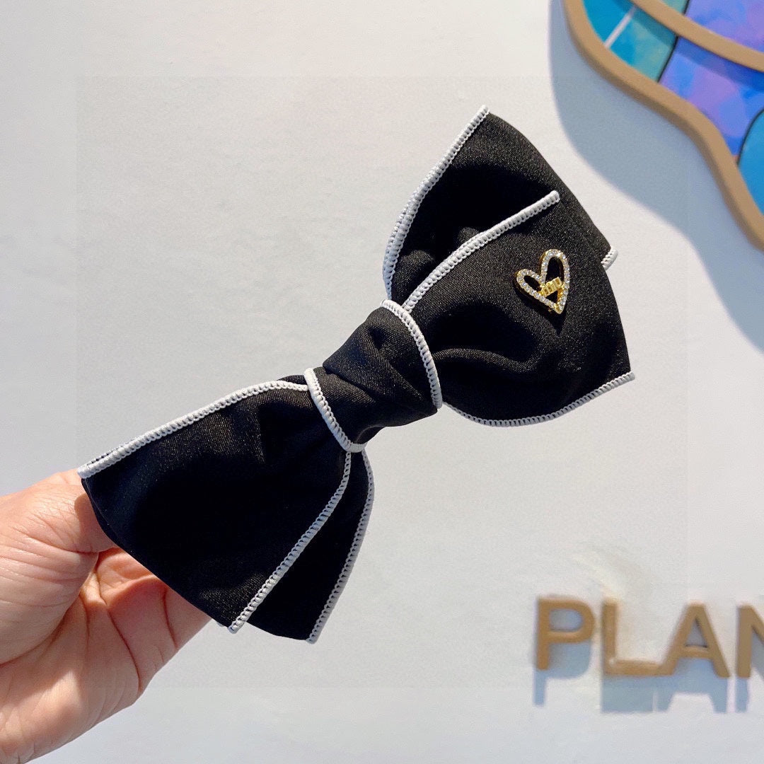 BOW HAIRPIN IN BLACK AND WHITE TRIM COTTON 406022