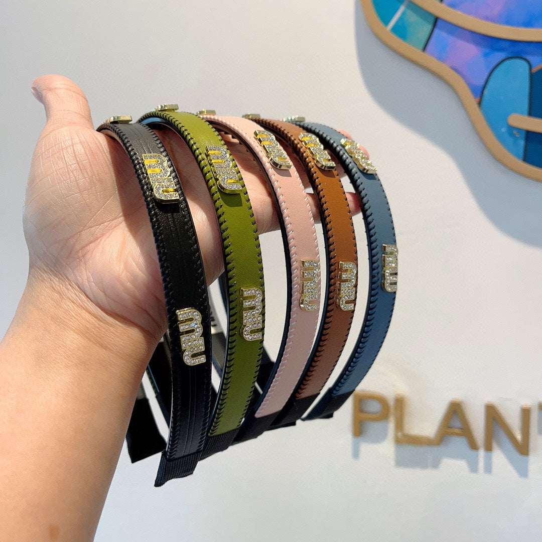 HEAD BAND IN BURNT ORANGE LAMBSKIN AND RESIN 417296