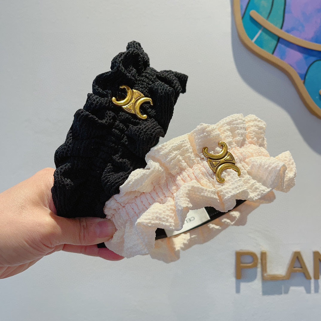 BLACK FABRIC WITH GOLD LOGO HAIRBAND 420627