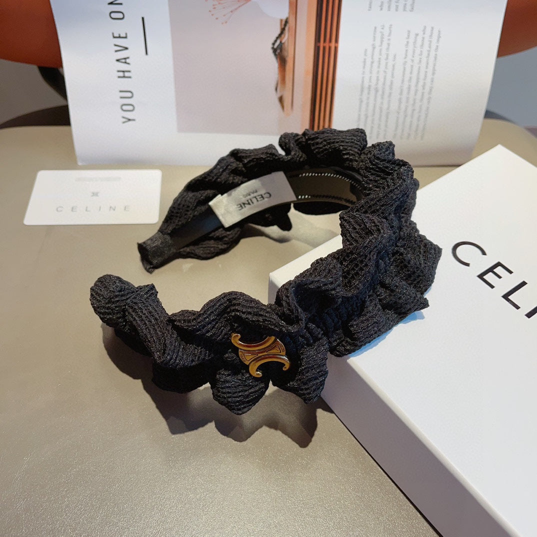 BLACK FABRIC WITH GOLD LOGO HAIRBAND 420627