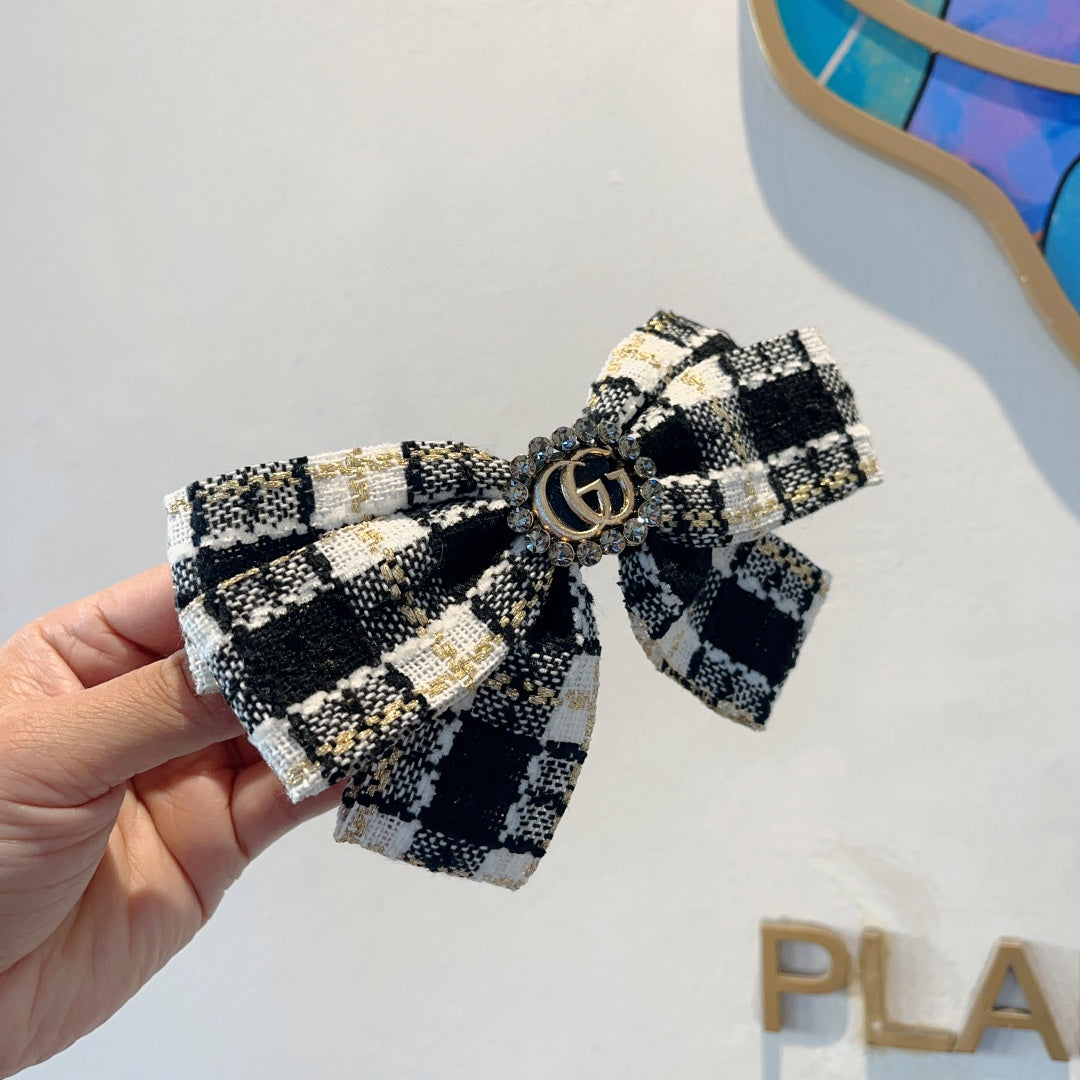 RETRO BOW HAIR CLIP IN BLACK MIX WHITE TWEED 432763