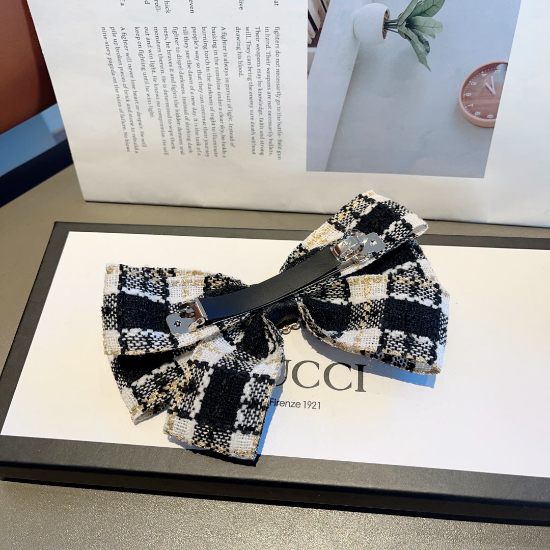 RETRO BOW HAIR CLIP IN BLACK MIX WHITE TWEED 432763