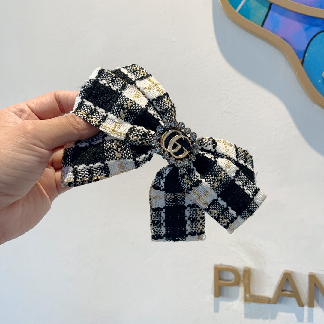 RETRO BOW HAIR CLIP IN BLACK MIX WHITE TWEED 432763