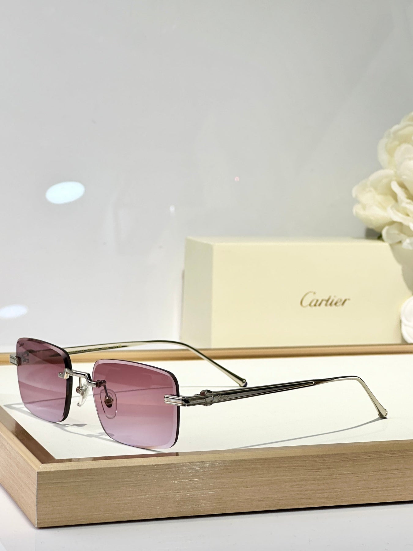 C DE RIMLESS SQUARE FRAME SUNGLASSES CT0610S IN METAL