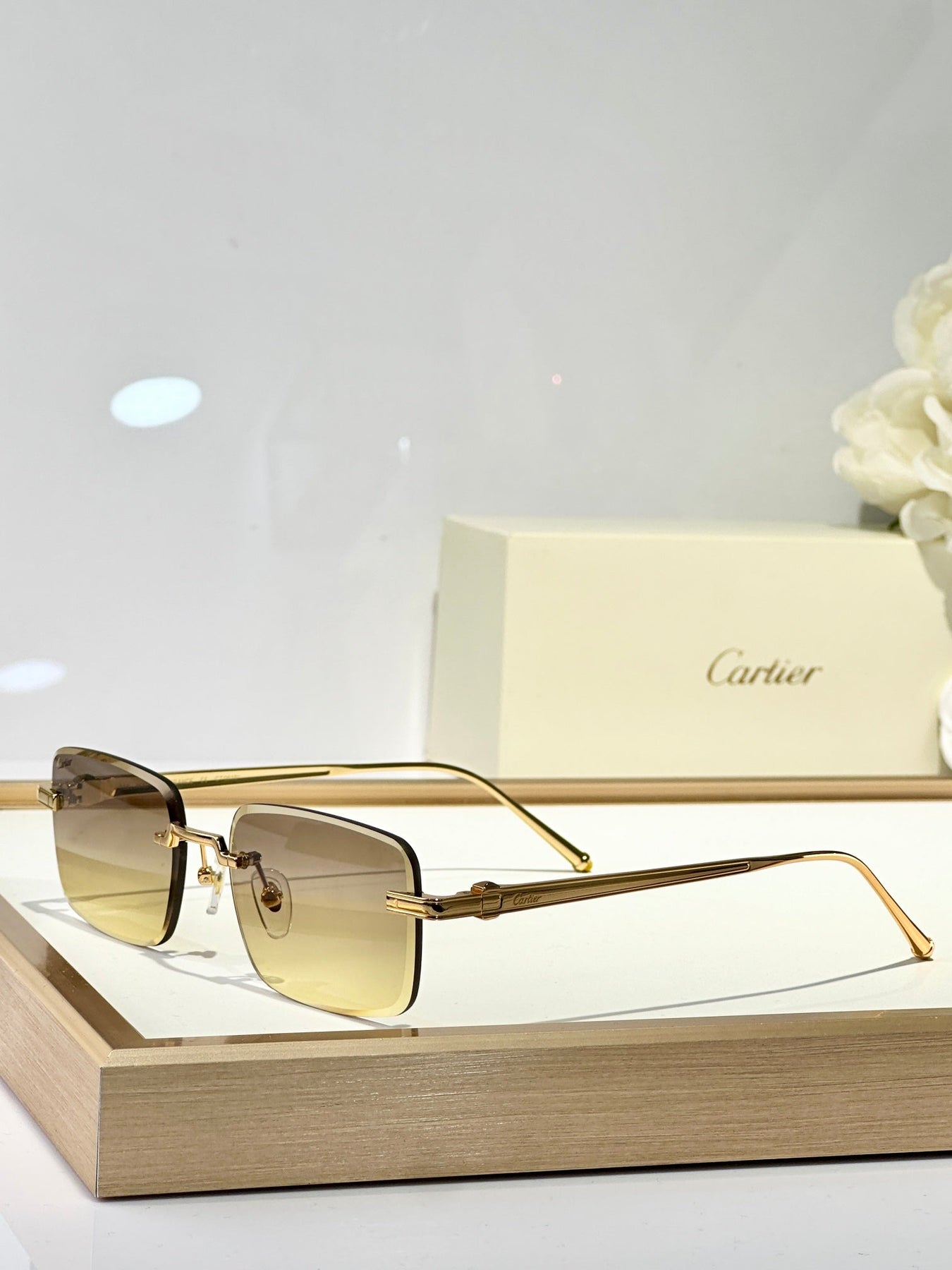 C DE RIMLESS SQUARE FRAME SUNGLASSES CT0610S IN METAL