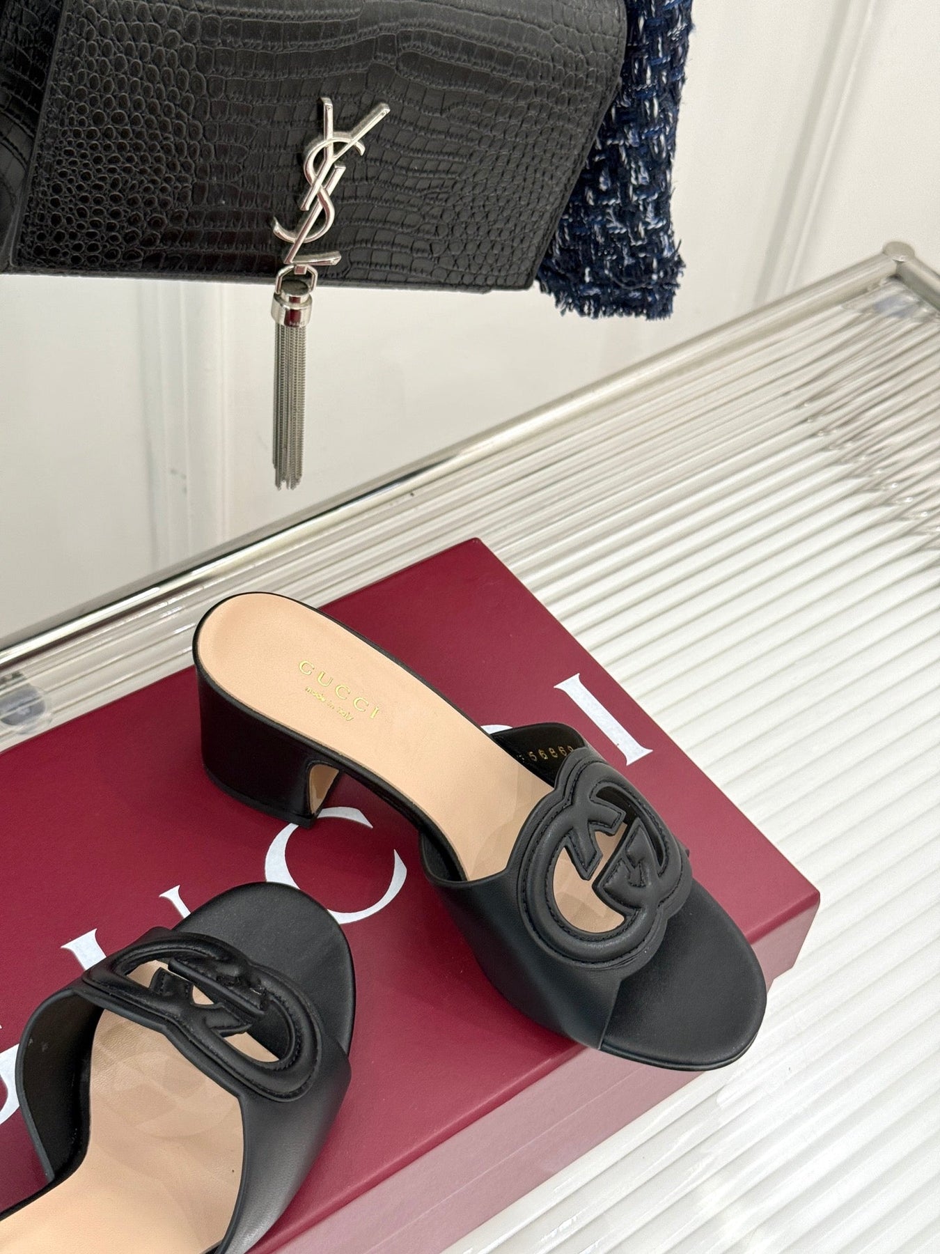 MID-HEEL MULE IN BLACK CALFSKIN