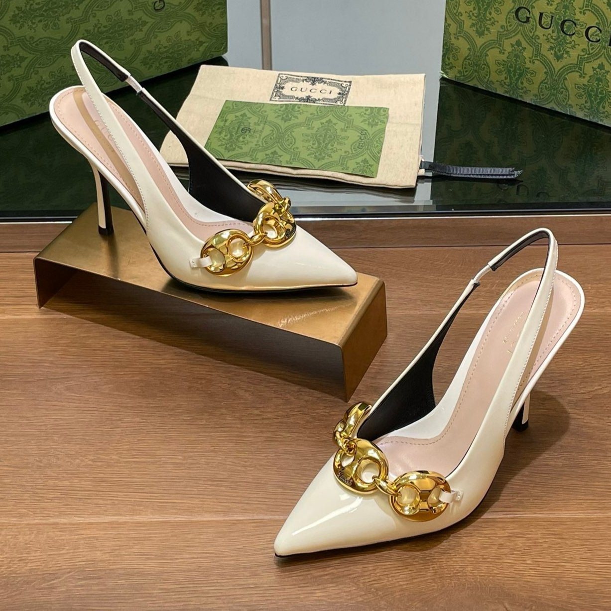 GG HIGH SLINGBACK 10.5 CM IN WHITE GLOSSY CALFSKIN WITH GOLD HARDWARE