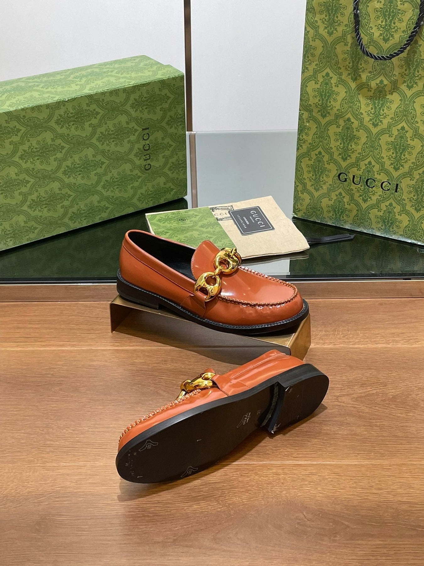 GG LOAFER SHOES IN BRONZE BROWN CALFSKIN WITH GOLD HARDWARE