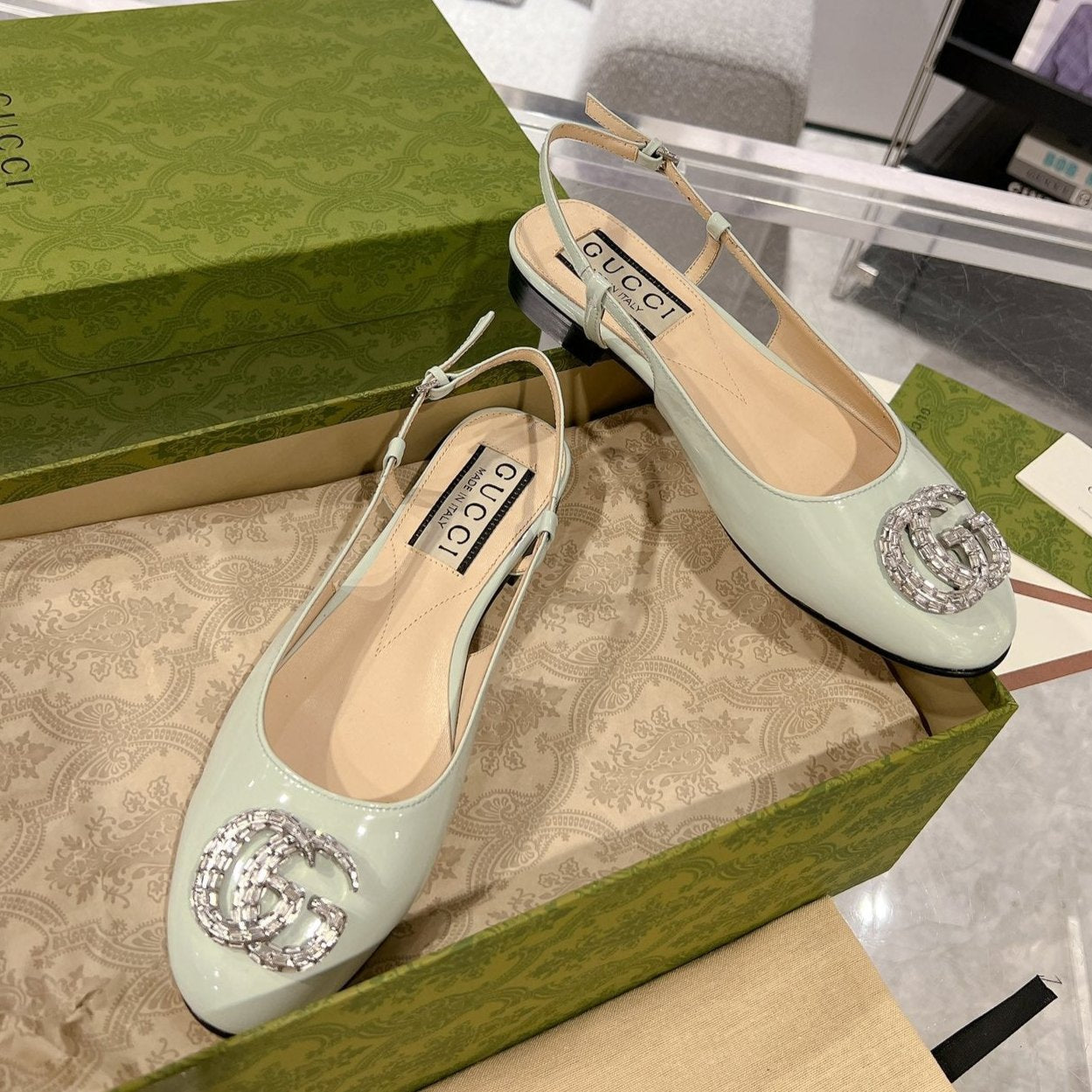 METALIC SLINGBACK FLATS IN PISTACHIO GREEN CALFSKIN