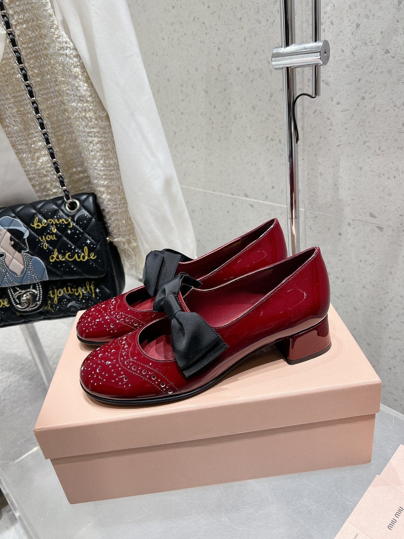 MARY JANE MID HEEL PUMPS IN RUBY RED PATENT LAMBSKIN WITH BOW