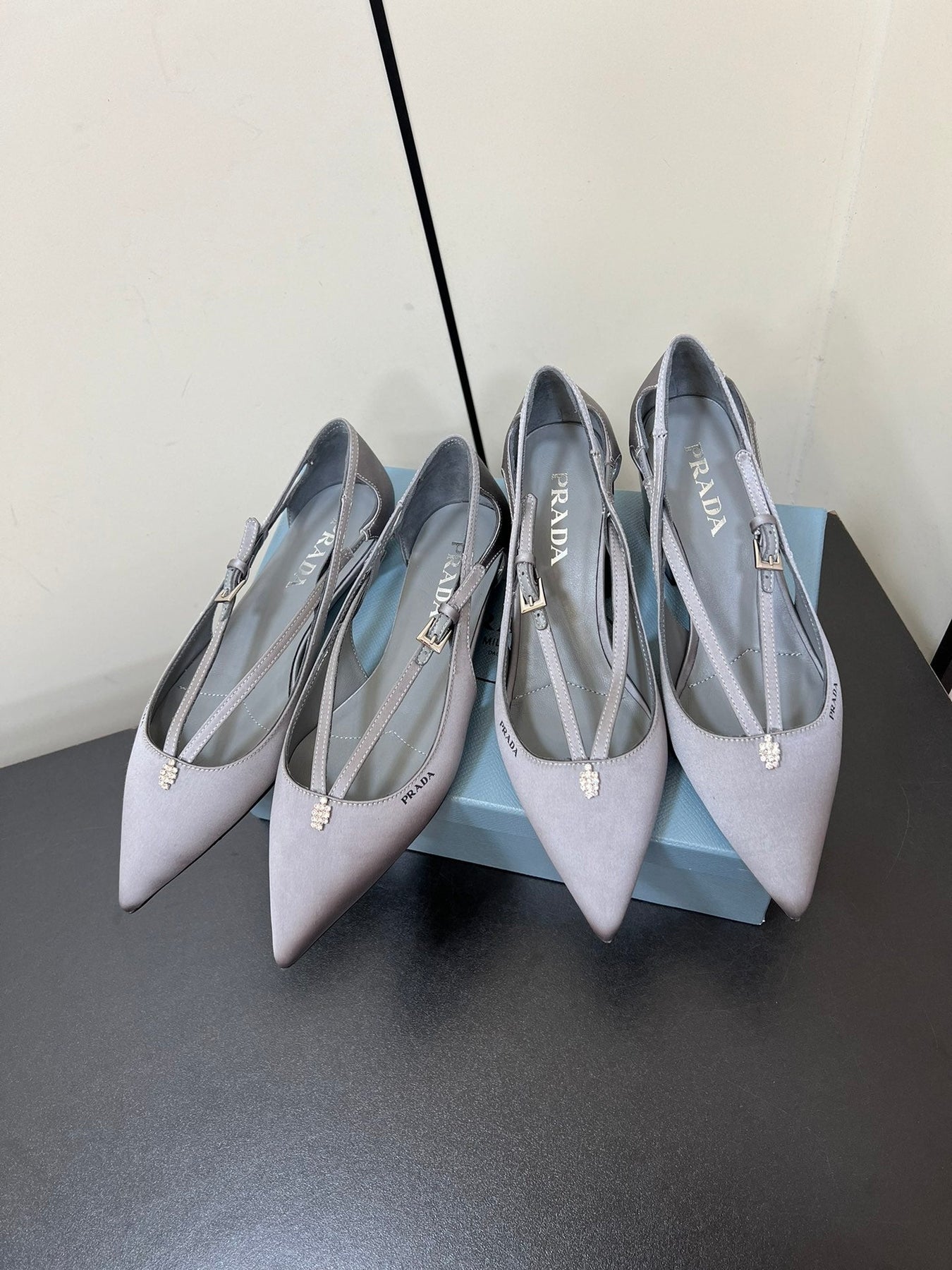 CUT-OUT PUMPS WITH BEAD BUCKLE IN WARM GRAY SATIN