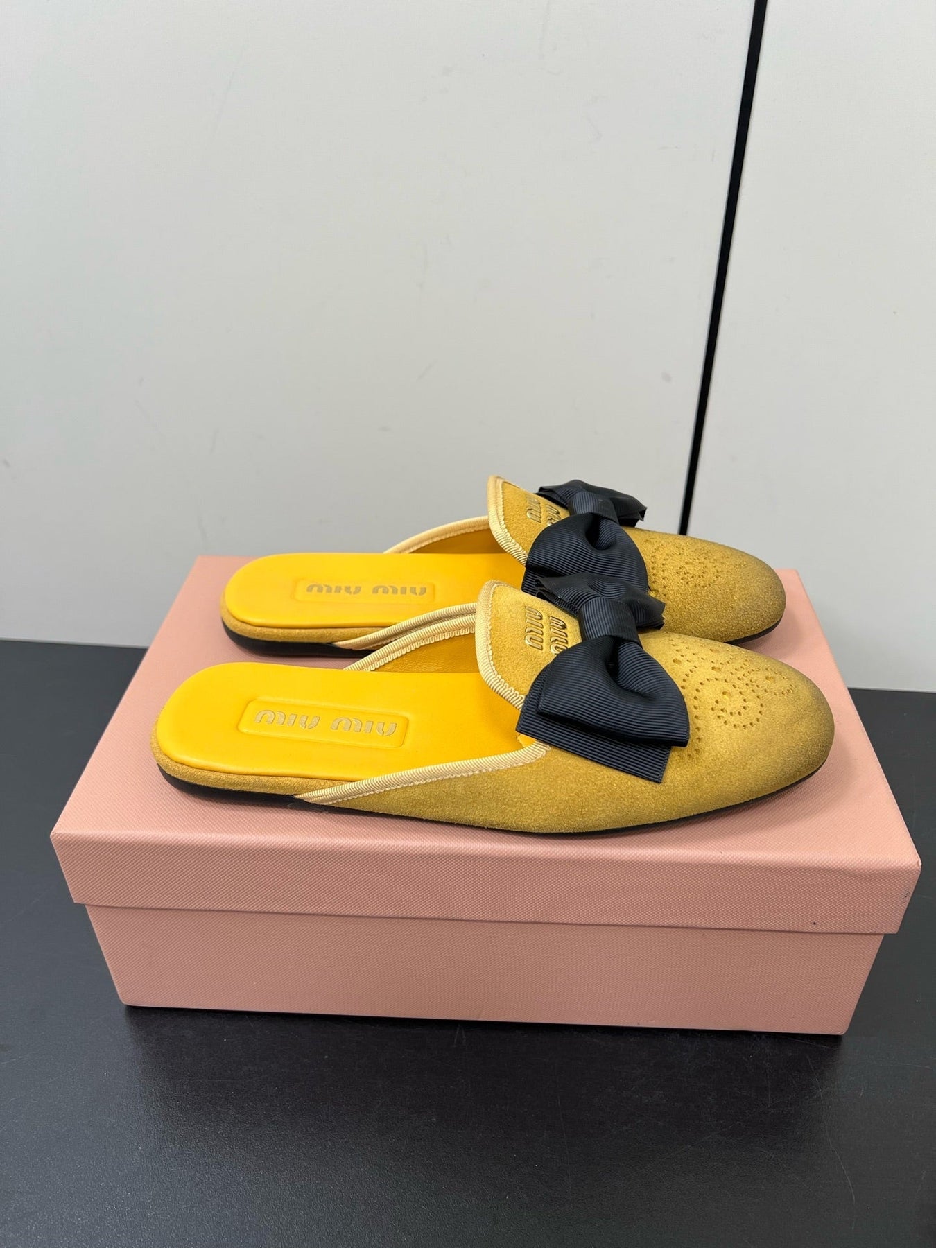 BOW MULES IN DUST YELLOW SUEDE