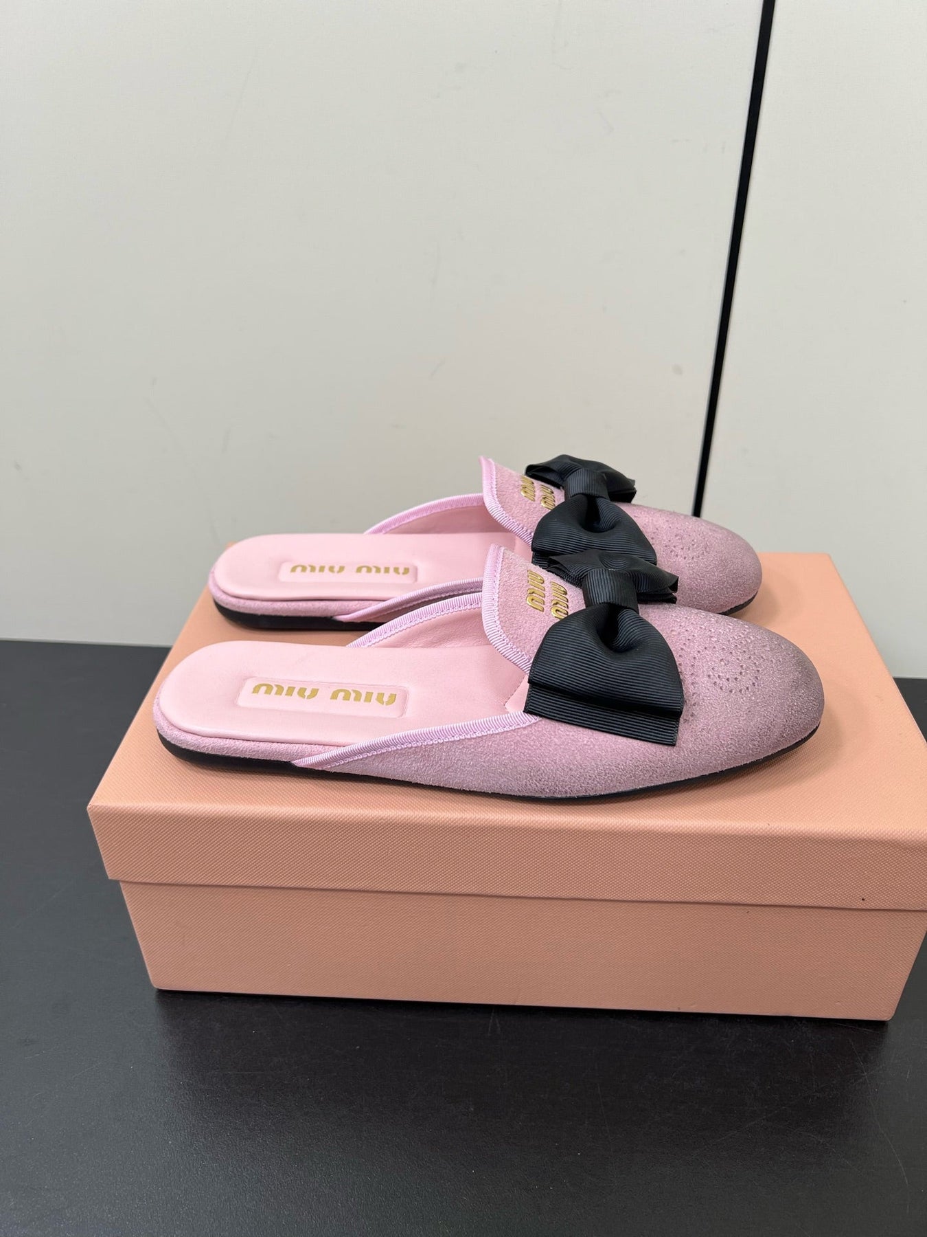 BOW MULES IN DUST PINK SUEDE