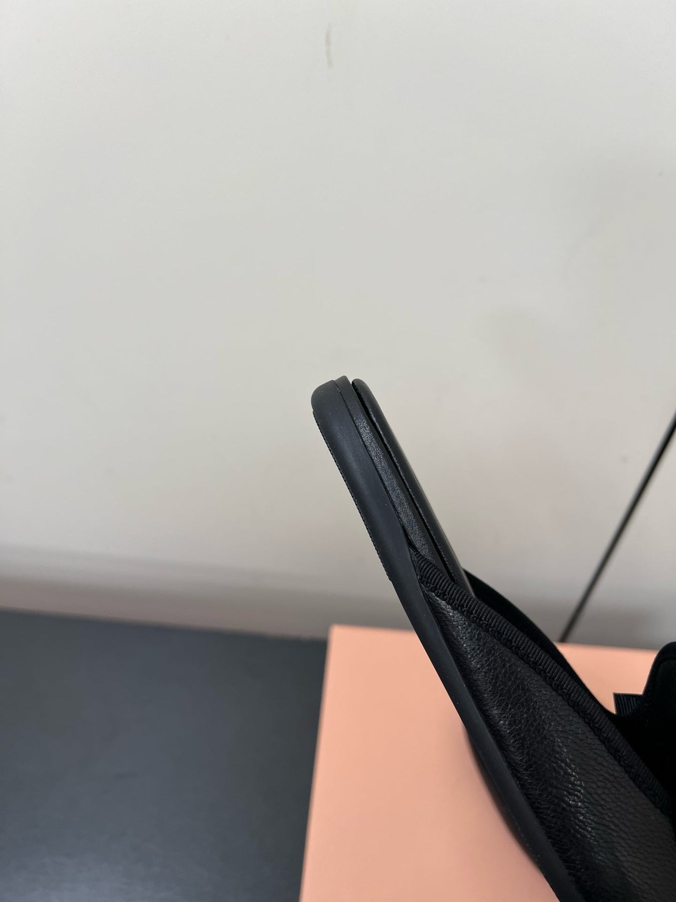 BOW MULES IN BLACK SHEEPSKIN
