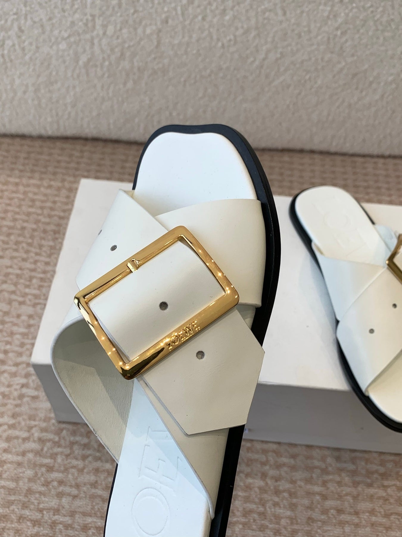 PETAL BELT FLAT SANDAL IN WHITE CALFSKIN