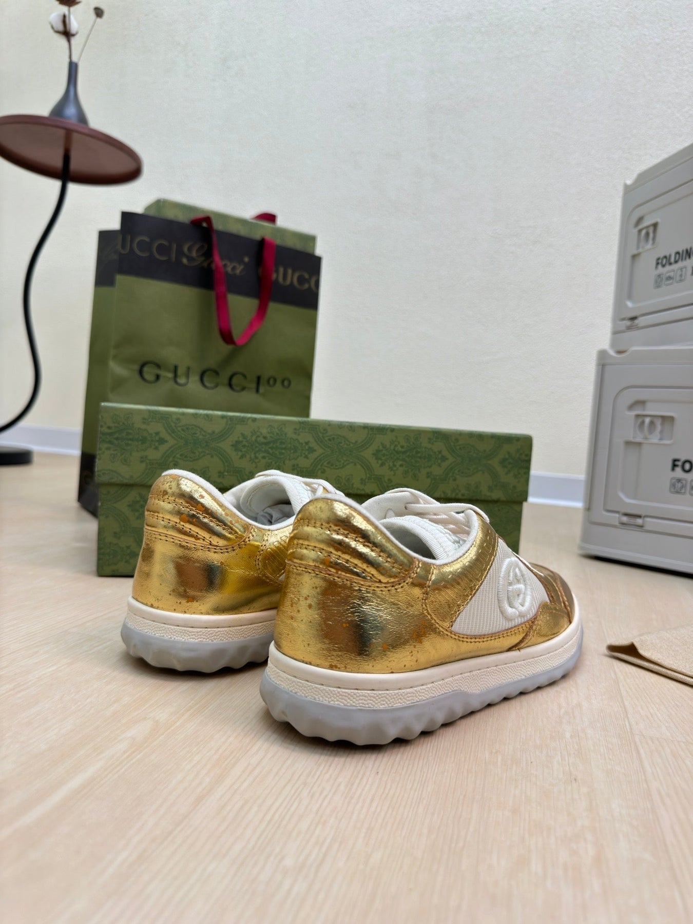 GG INTERLOCKING G SNEAKER GOLD CALFSKIN AND FABRIC